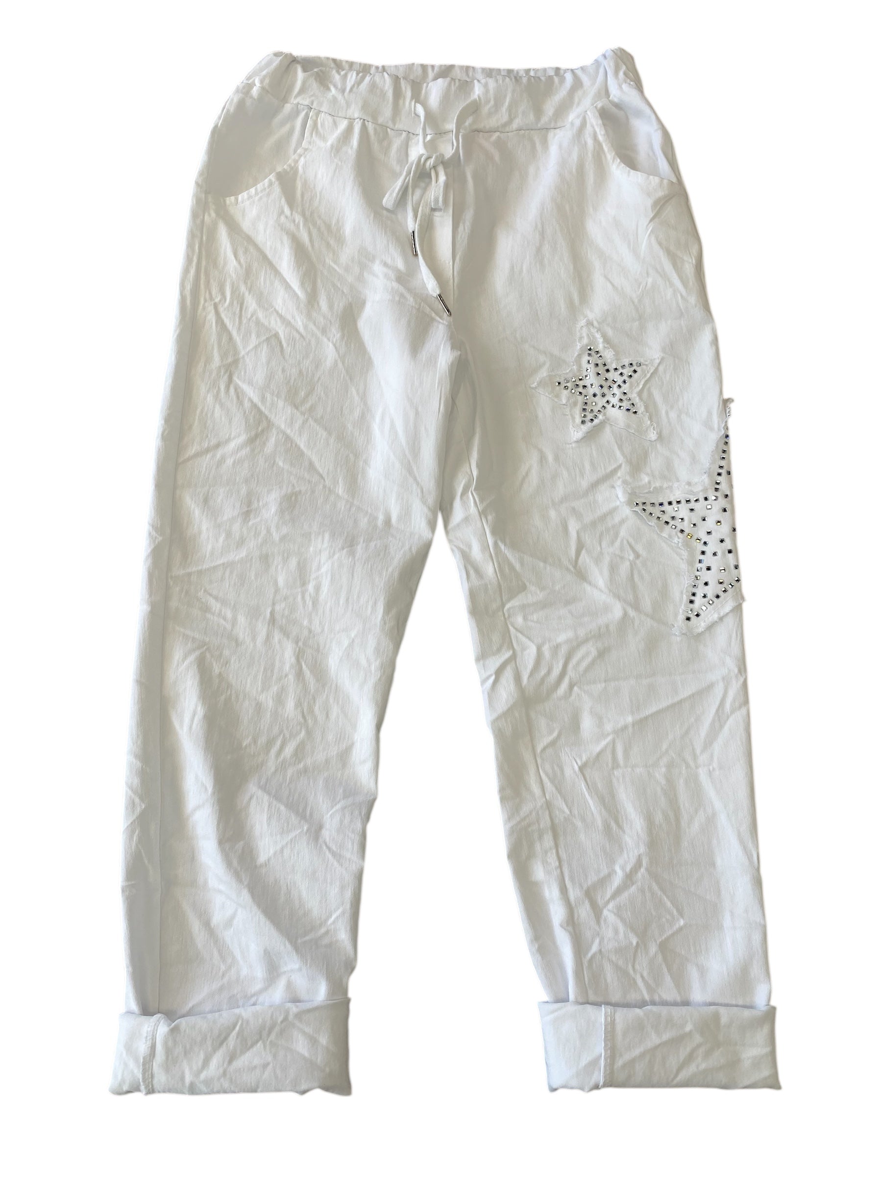 White pants with star-shaped embellishments on a white background