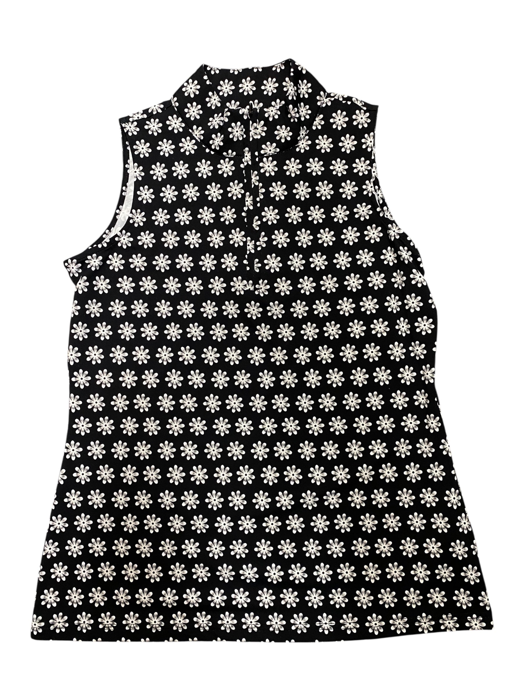 Black sleeveless dress with white floral pattern on a white background